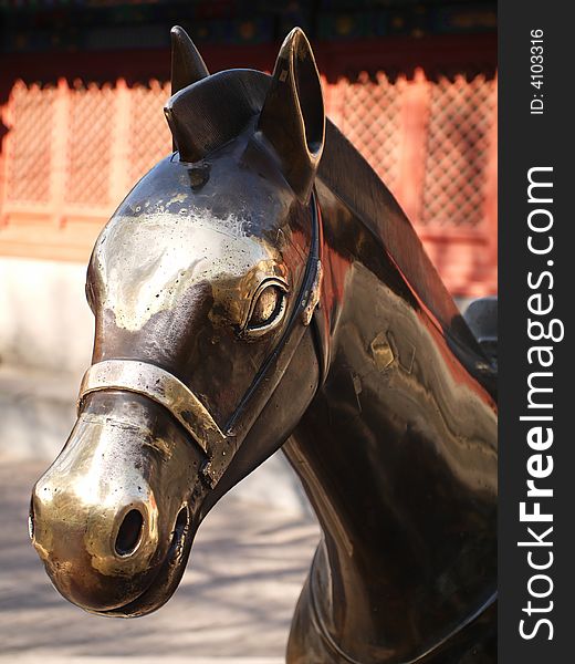 An old copper horse in the temple