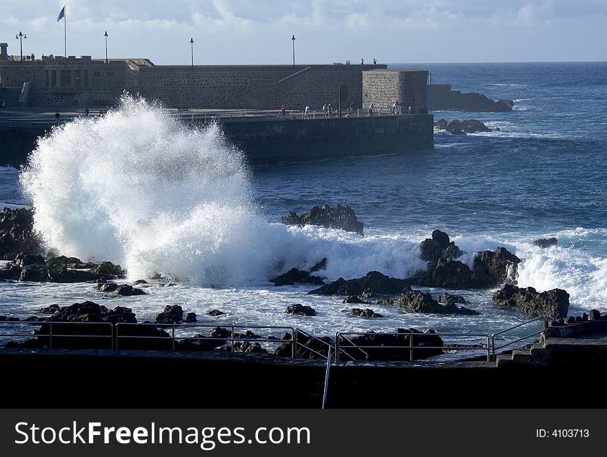 Surf beside a small harbour on Tenerife. Surf beside a small harbour on Tenerife.