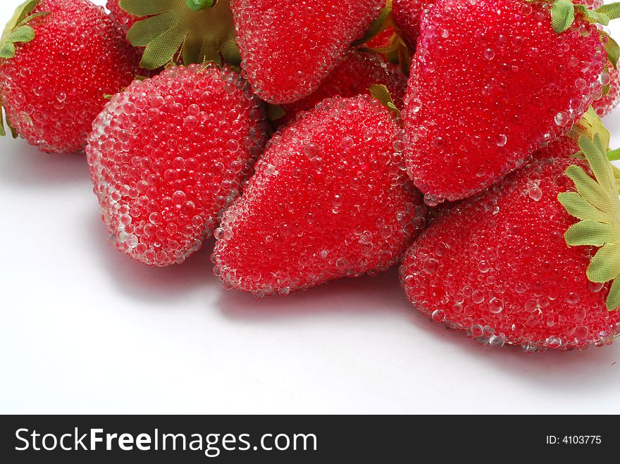 Artificial strawberries on white background. Artificial strawberries on white background