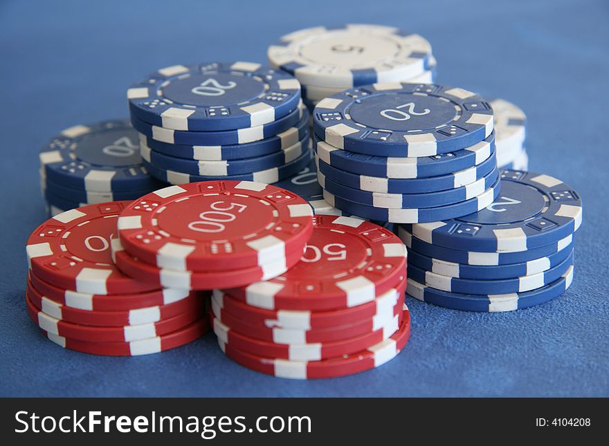 A selection of pokerchips on a poker table