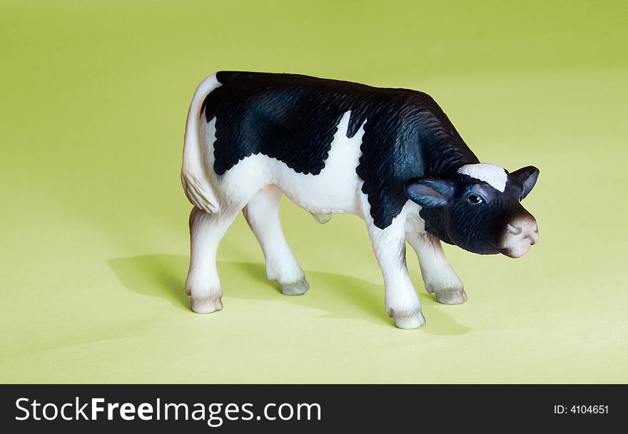 Bychok small Bull cow statue greens eye muzzle hooves spots miniature farm summer grass baby