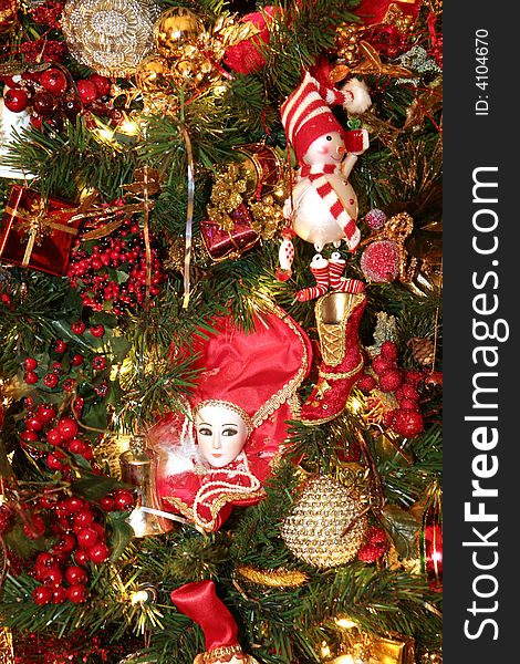 Custom christmas ornaments of snowmen and angels on a nice tree. Custom christmas ornaments of snowmen and angels on a nice tree
