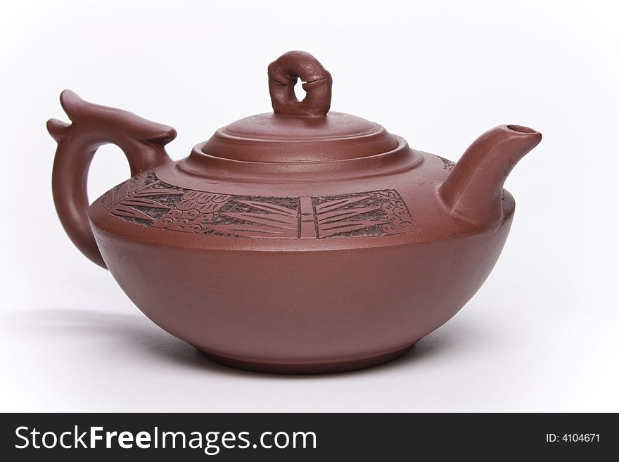 Brown clay teapot from China.