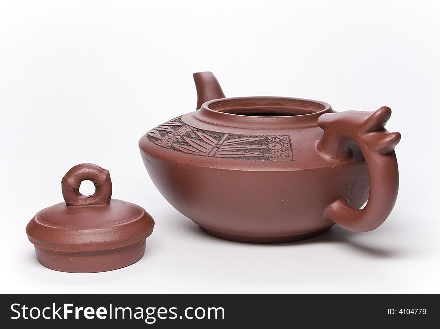 Brown clay teapot from China.