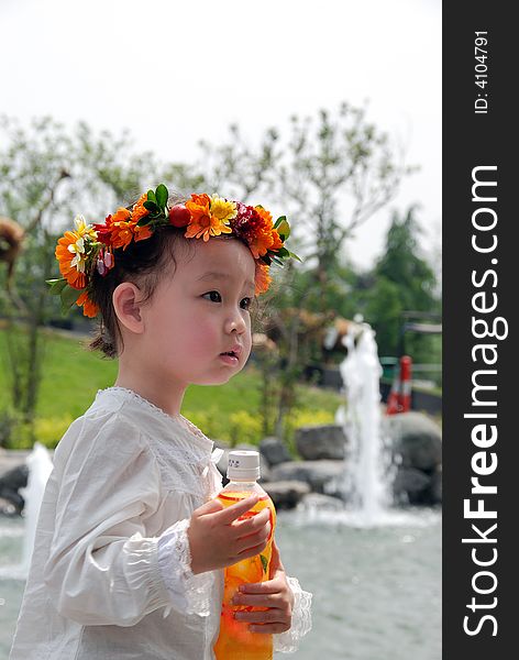 Lovely Child With A Coronet Of Flowers