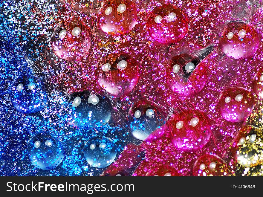 Macro shot of beautiful colored water drops