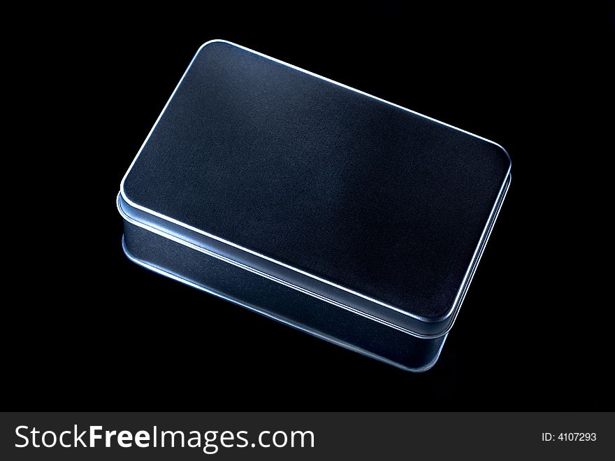 Closeup of elegance, metal box, isolated over black