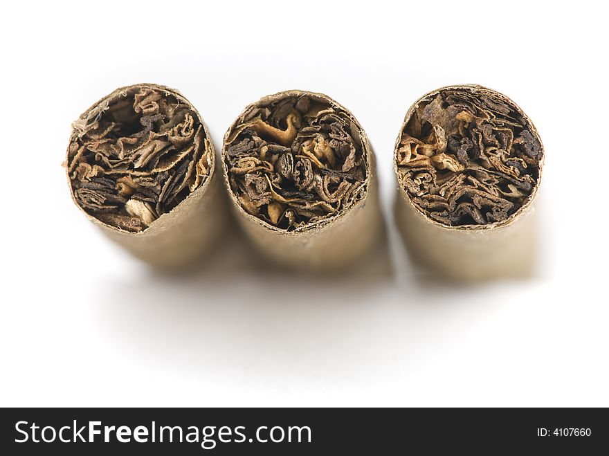 Front view of three cigars on white background. Front view of three cigars on white background