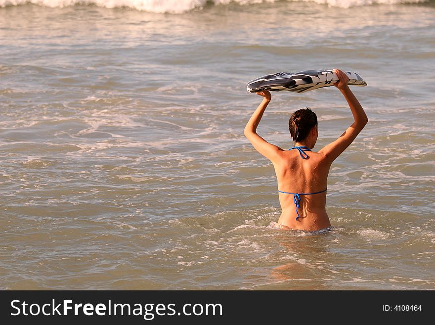 Woman with surfing board