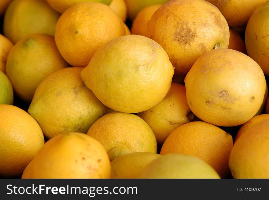 Farmers market fruit stand natural lemons