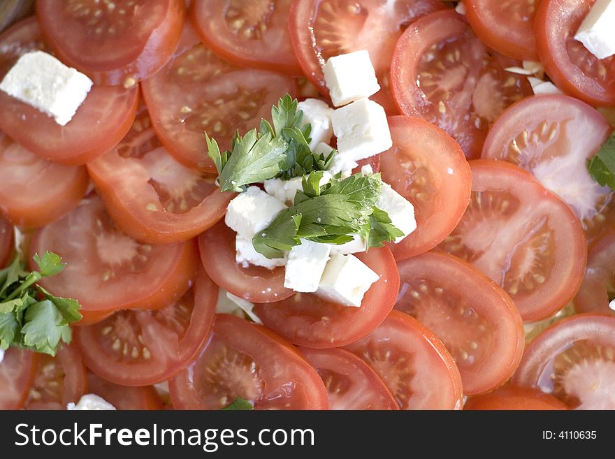 Light snack from tomatoes with soft cheese