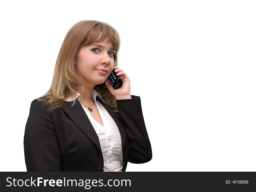 Beautiful young businesswoman with phone isolated over a white background