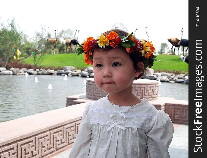 A beautiful Chinese young childï¼Œ a pure and angelical face. A beautiful Chinese young childï¼Œ a pure and angelical face