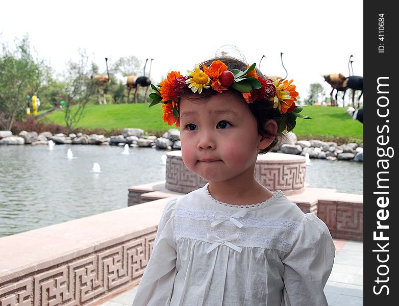 Lovely Child With A Coronet Of Flowers