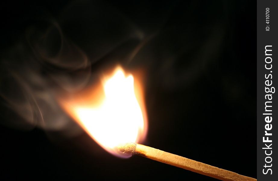 Closeup of a burning match. Closeup of a burning match