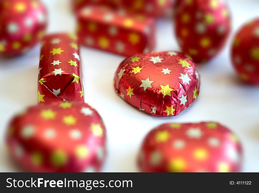 An image of sweetmeats in red wraping