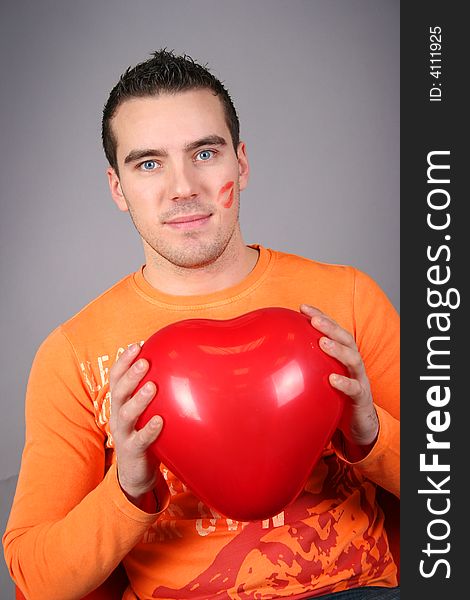 Funny guy with red balloon