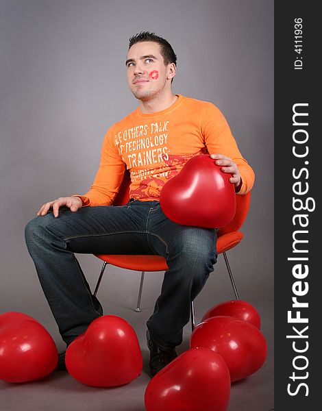 Funny guy with red balloons