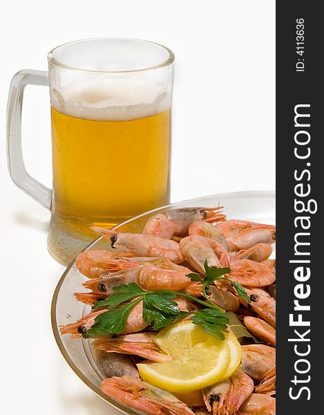 Beer with shrimps on white background