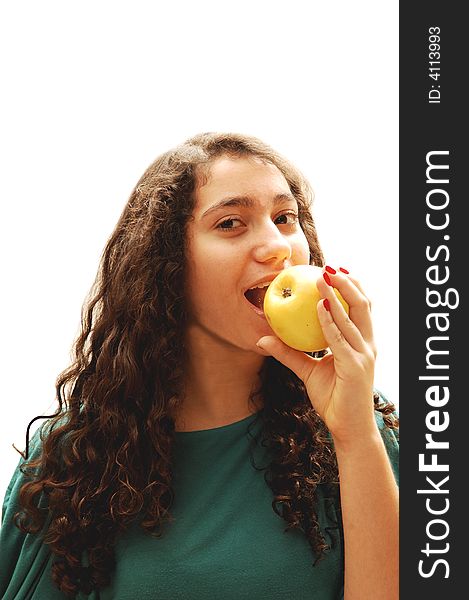 A pretty lady whit an green apple for her diet standing for white background. A pretty lady whit an green apple for her diet standing for white background.