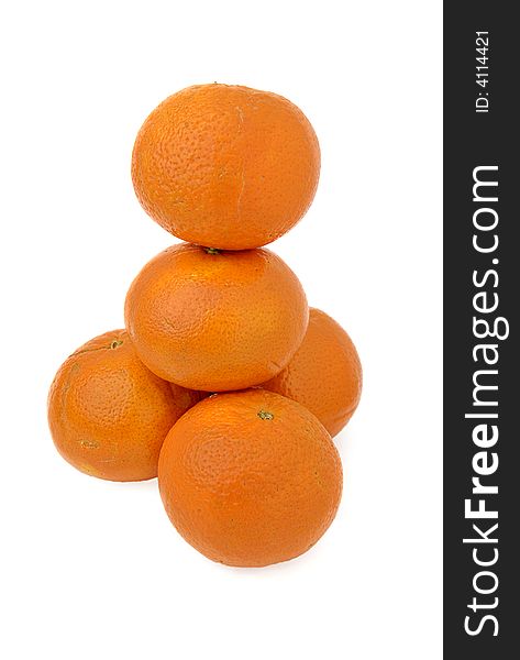 Stack on a tower made of mandarins. Stack on a tower made of mandarins