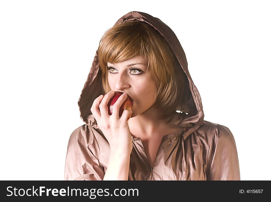 Beautiful woman eating an apple on the isolated white background