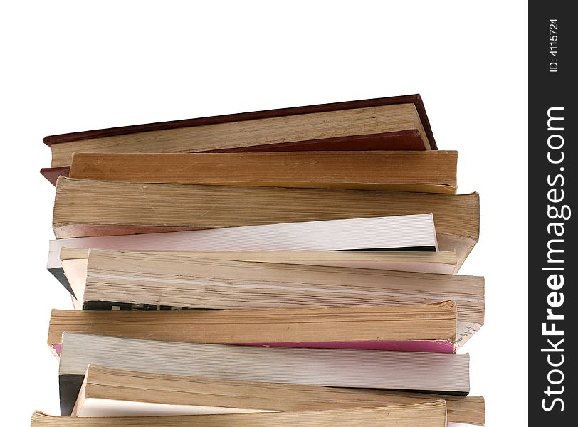 Stack of old books isolated on white