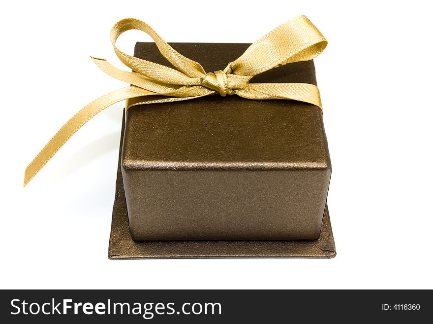 Brown gift box with gold ribbon