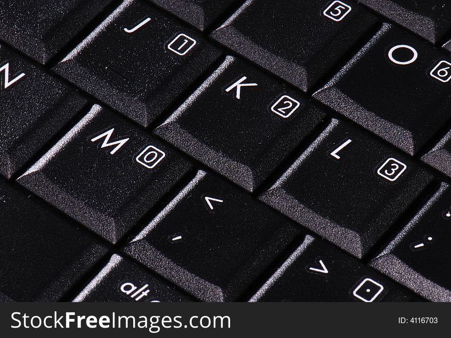 Keys on a computer keyboard in close-up. Keys on a computer keyboard in close-up