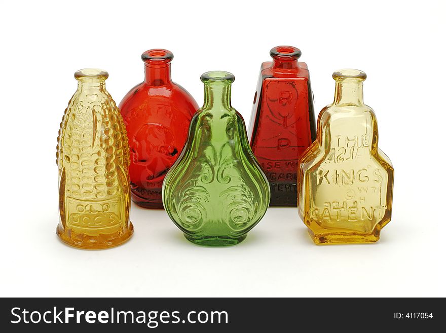 Isolated shot of a collection of vintage medicine bottles. Isolated shot of a collection of vintage medicine bottles.