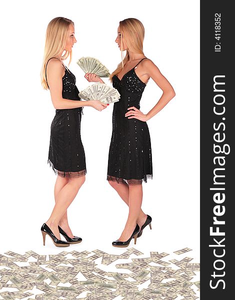 Twin girls holding Dollars on white