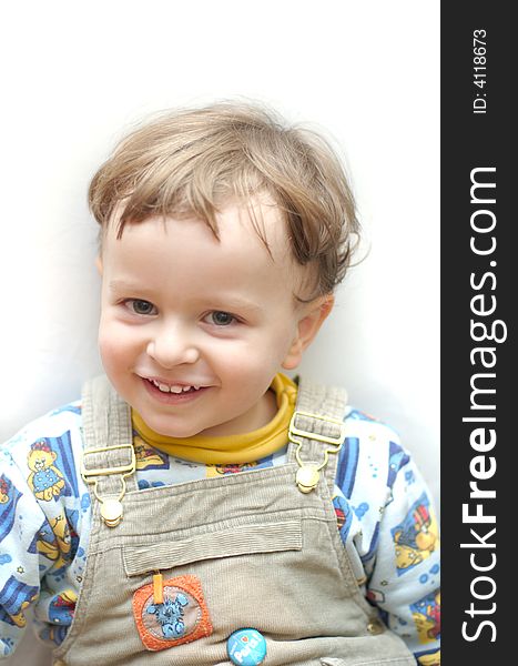 Baby boy child smiling positive over light background
