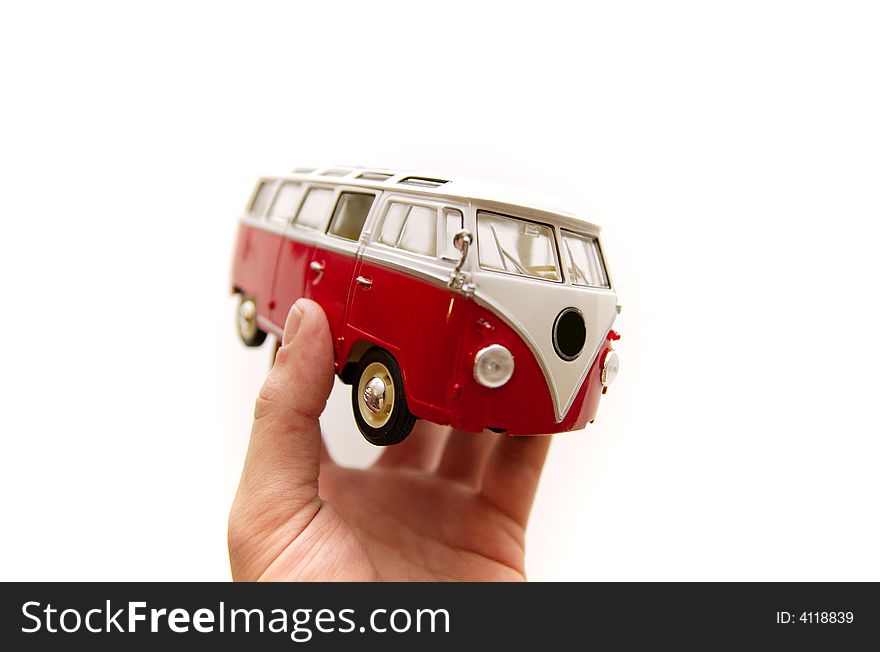 An Old Bus Toy In Hands