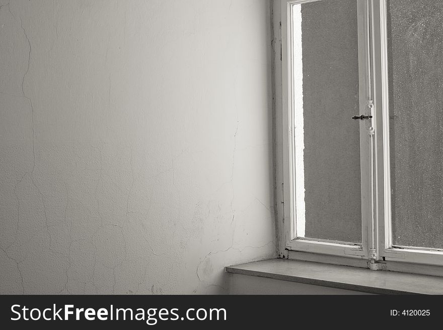 Old white wooden window and wall