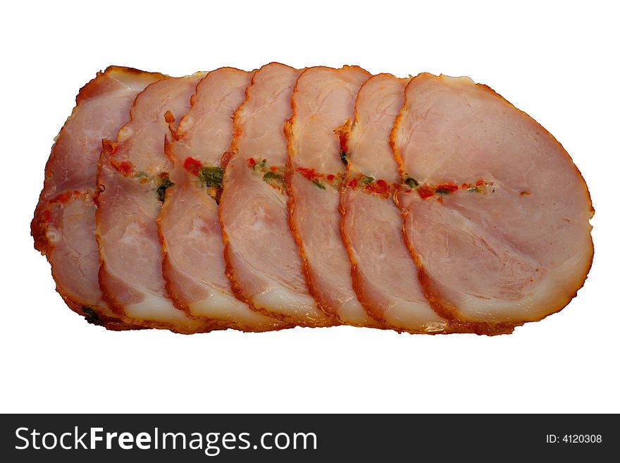 Slices of a ham with spices isolated on a white background