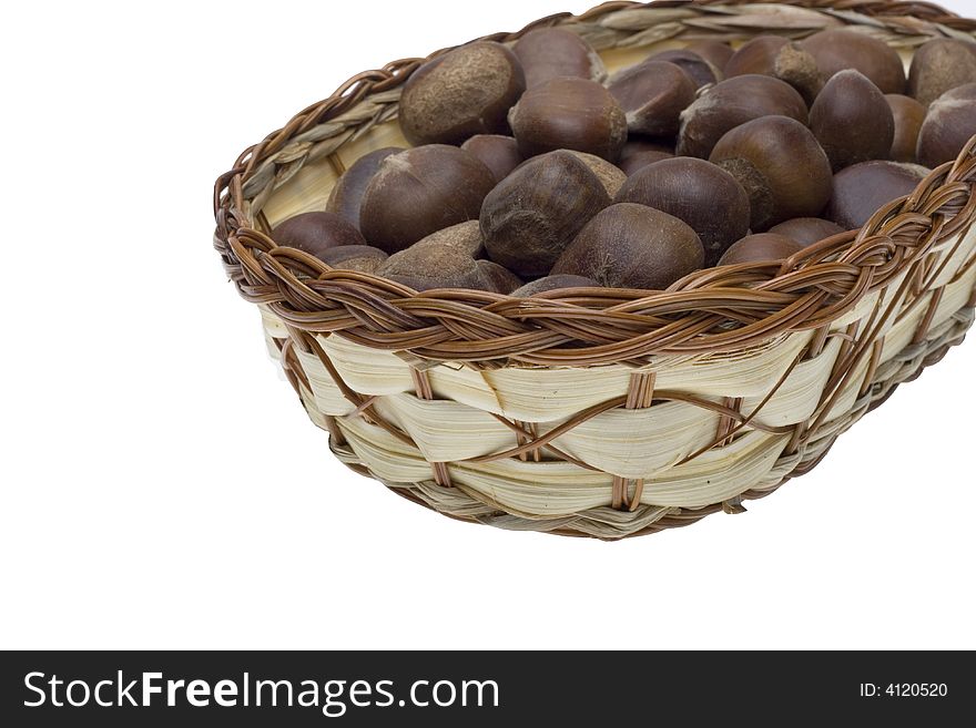 Chestnuts in the basket on white backgrounds