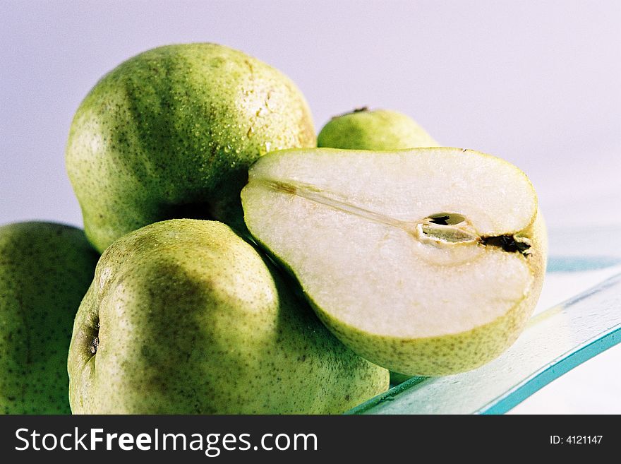 A plate of fresh pears. A plate of fresh pears