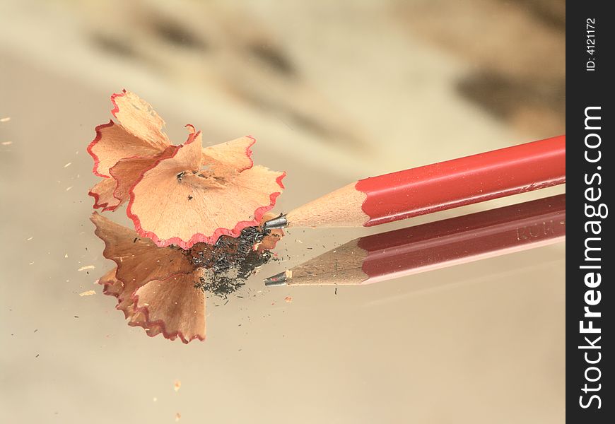 Sharpened pencil and wood shavings