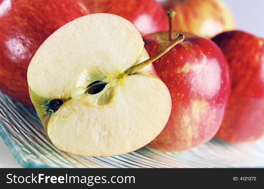 A plate of fresh red apples