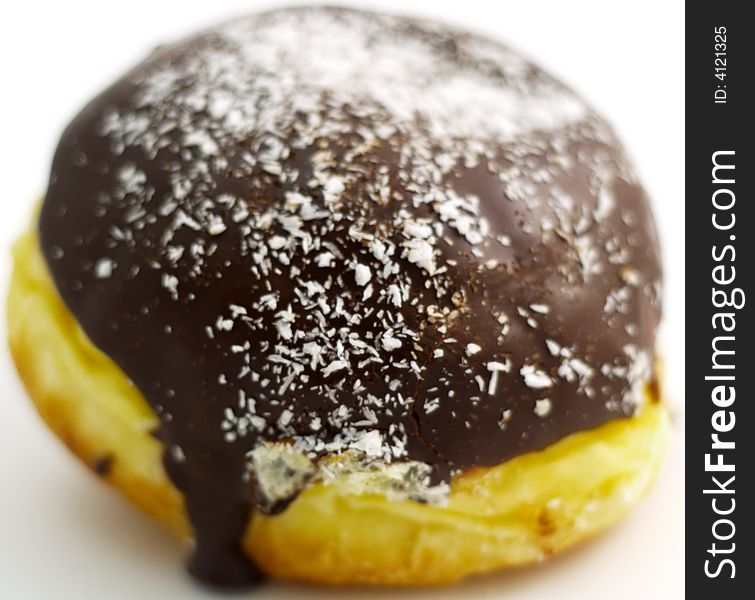 Chocolate donut (very shallow DOF) isolated on white background