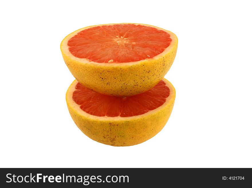 A Isolated pink grapefruit halveson white