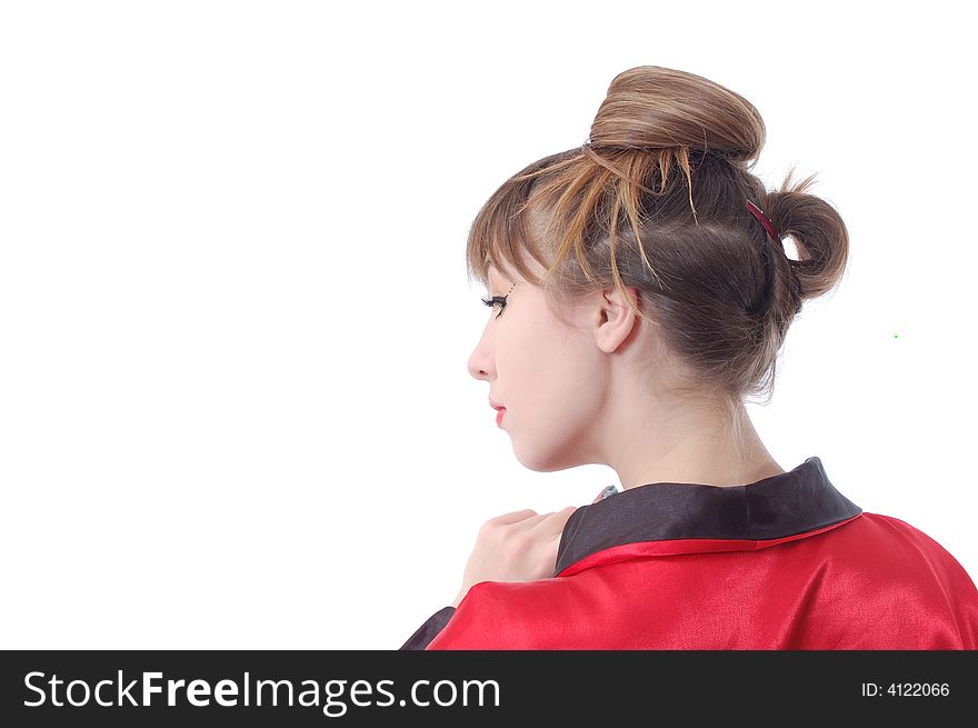 Attractive girl in red kimono stay to turn the head backward. isolated over white. whith copyspace. Attractive girl in red kimono stay to turn the head backward. isolated over white. whith copyspace