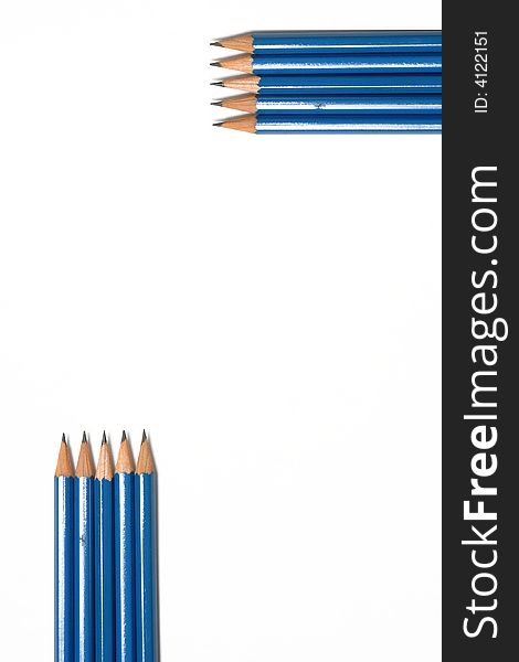 White background with pencils at the corner
