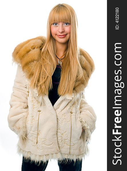 Woman in fur over white background