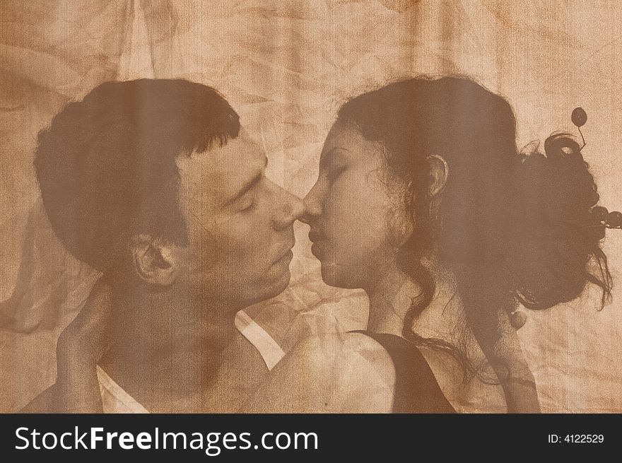 The enamoured girl and the guy embrace. Sepia. The enamoured girl and the guy embrace. Sepia