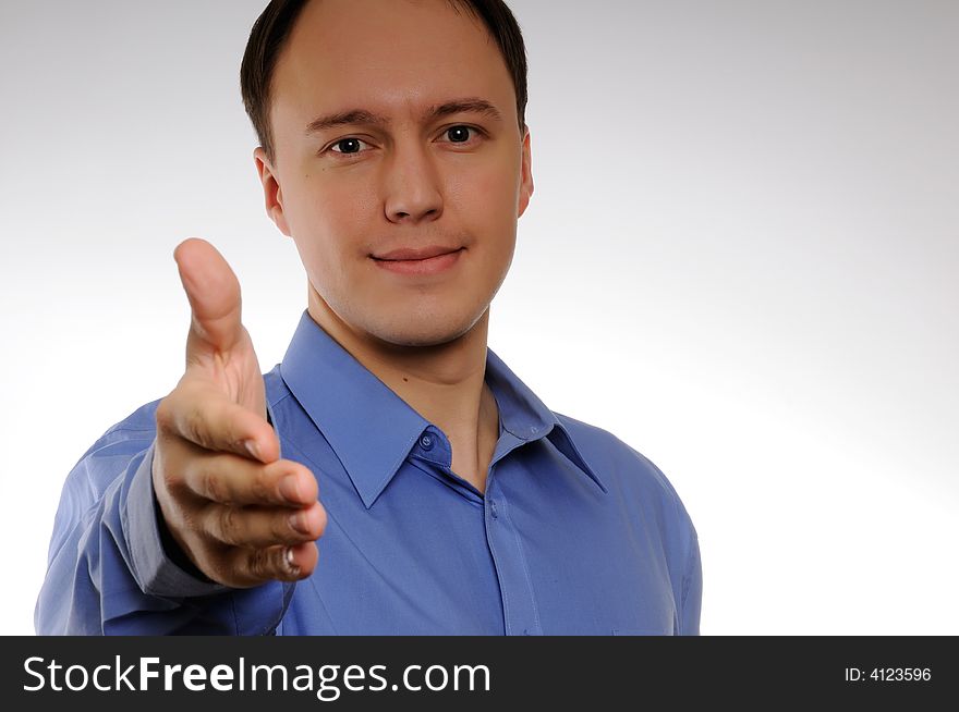 Businessman in a shirt to be going to shake hands. Businessman in a shirt to be going to shake hands