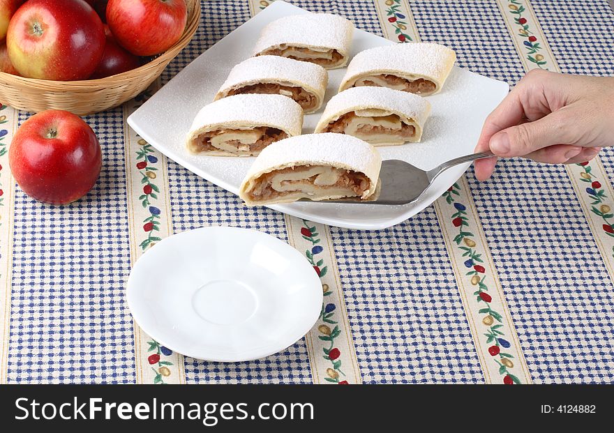 Apple roll and fresh apples. Apple roll and fresh apples