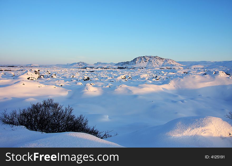 Snow covered landscape in winter, very cold and pristine. Snow covered landscape in winter, very cold and pristine