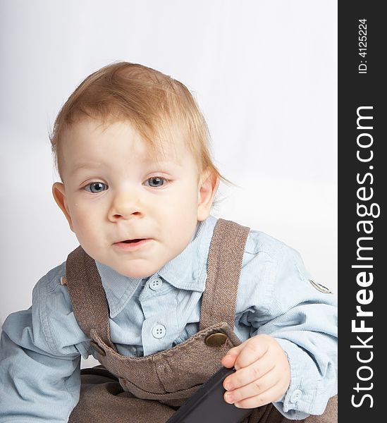 Portrait small boy with phone in hand