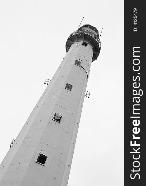 Photo of a lighthouse in black and white. Photo of a lighthouse in black and white